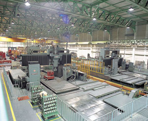 Large five-surface processing machines are at the heart of a bulk-product FMS plant